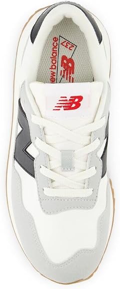 New Balance Kids 237 V1 Lace Up Sneaker, White/Black, 4.5 M Big Kid