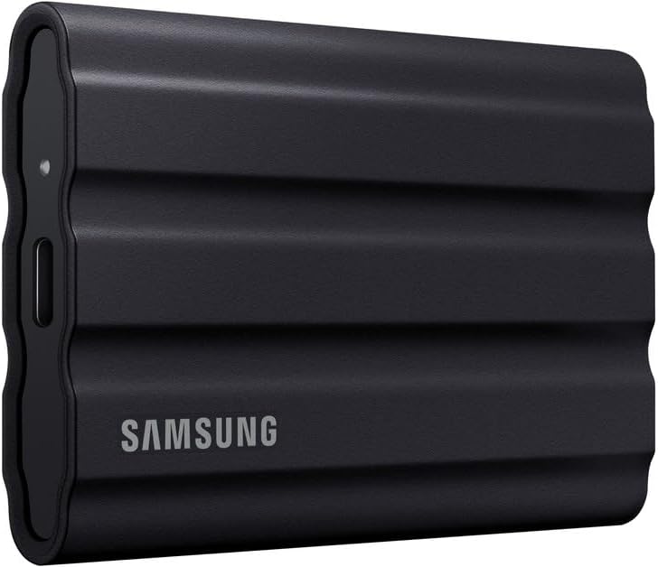 Samsung Portable SSD T7 Shield, 1TB, USB 3.2 Gen.2, 1050MB/s Read, 1000MB/s Write, Robust External Hard Drive Outdoor for Mac, PC and Smartphone, Black, MU-PE1T0S/EU