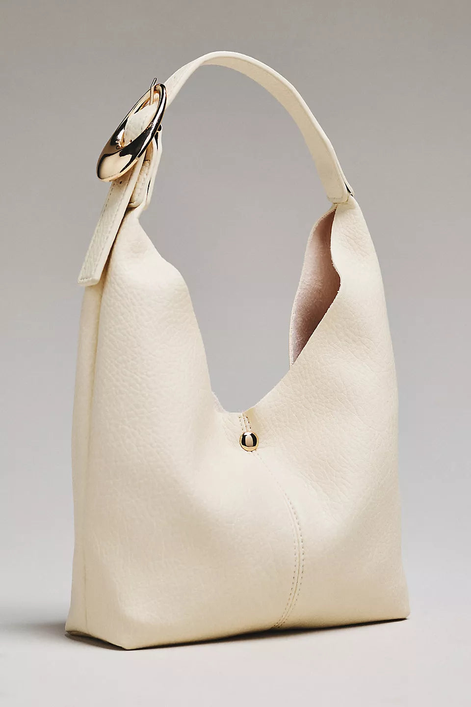 The Love Knot Slouchy Bag: Mini Buckle Edition by Anthropologie - Cream