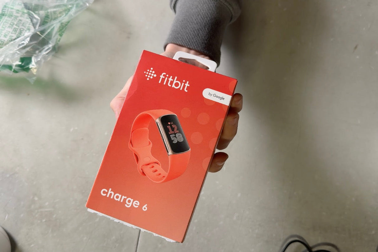 Fitbit Charge 6 Fitness Tracker with Google apps, Heart Rate on Exercise Equipment, 6-Months Premium Membership Included, GPS, Health Tools and More, Gold/Coral, One Size (S & L Bands Included)