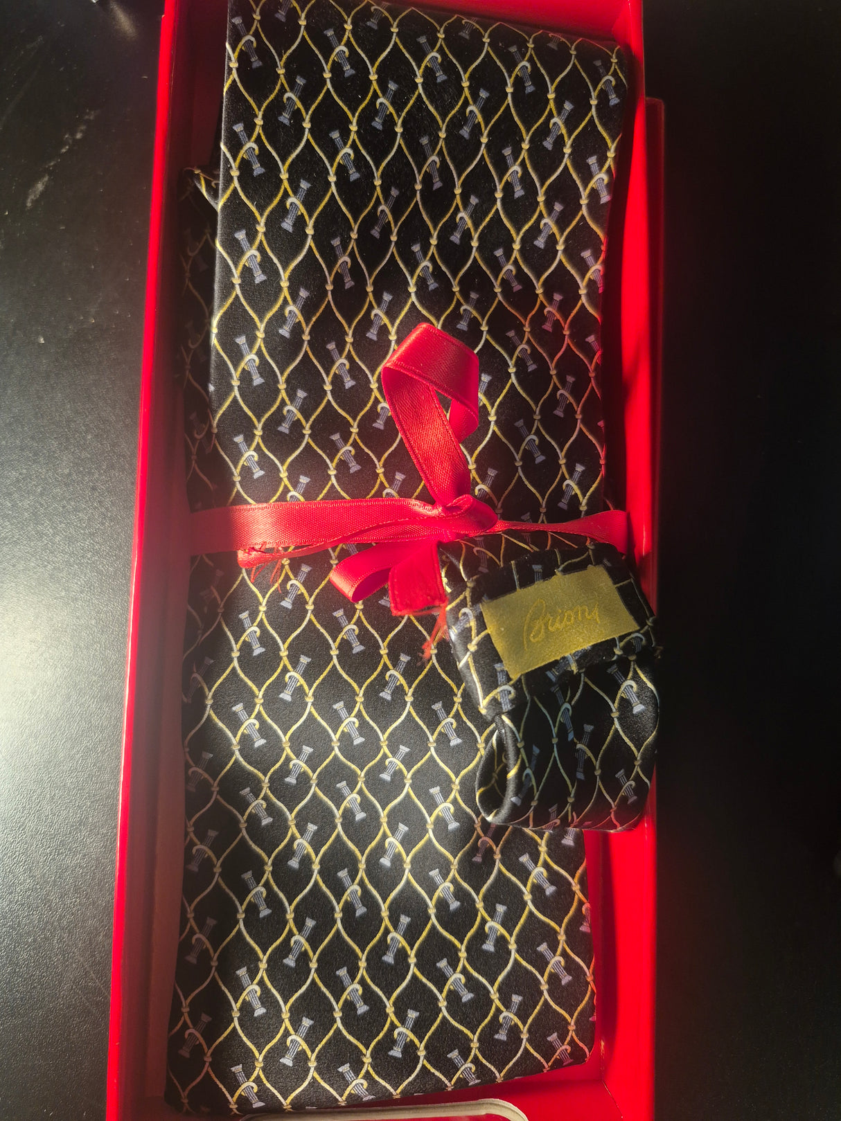 Vintage Brioni Tie 100% Silk Black Background, Gold, And Silver, Repeating Pattern Columns