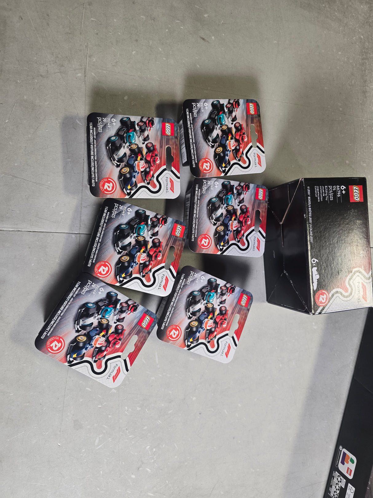 LEGO F1 Collectible Race Cars, 6 Pack - Building Set for Boys & Girls, Ages 6+ - Birthday Party Favor or Gift - Mystery Box W/Surprise F1 Car Toys - Travel Toys for Kids - 66796