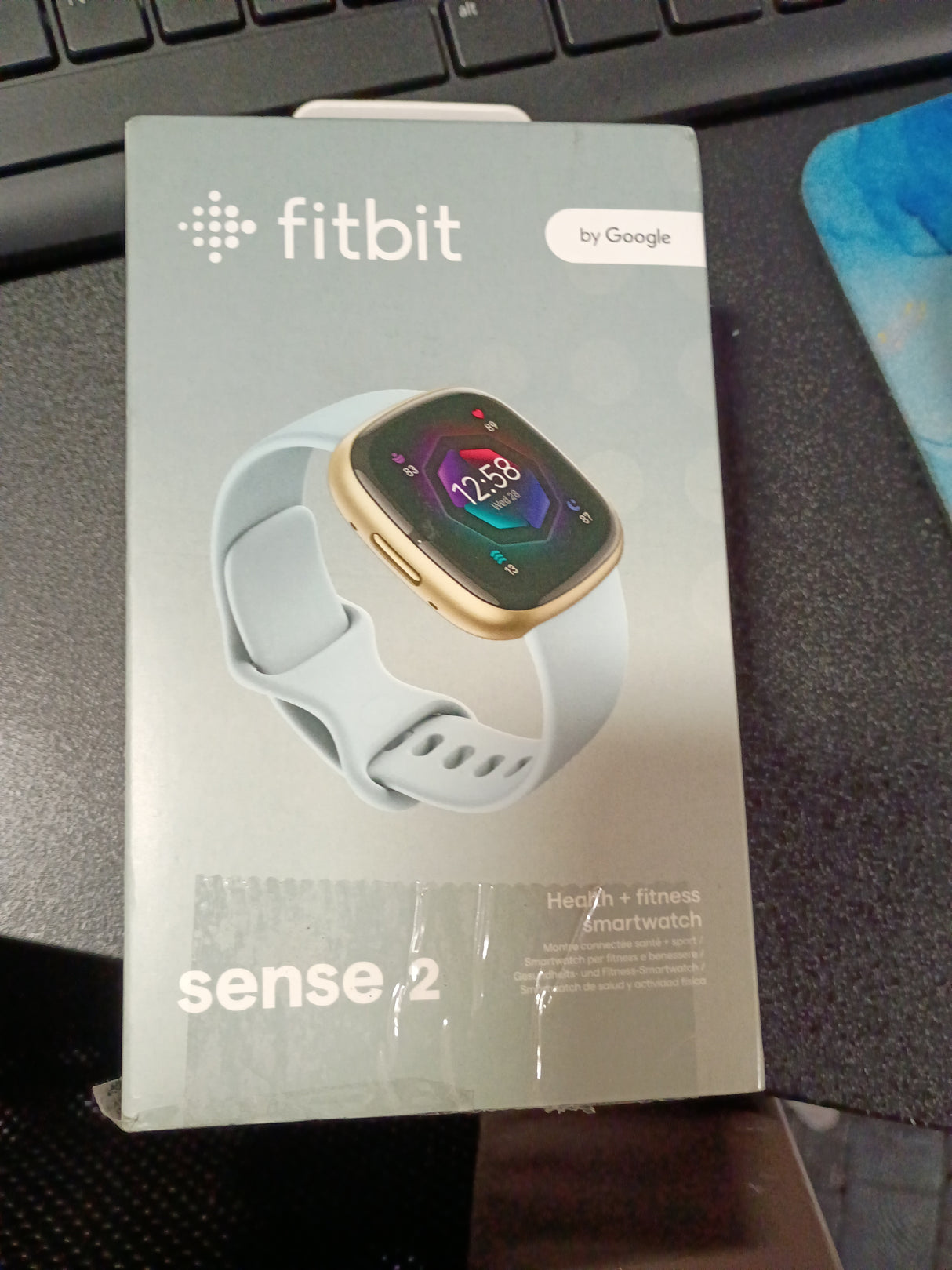 Fitbit Sense 2 Advanced Health and Fitness Smartwatch with Tools to Manage Stress and Sleep, ECG App, SpO2, 24/7 Heart Rate and GPS, Blue Mist/Pale Gold, One Size (S & L Bands Included)
