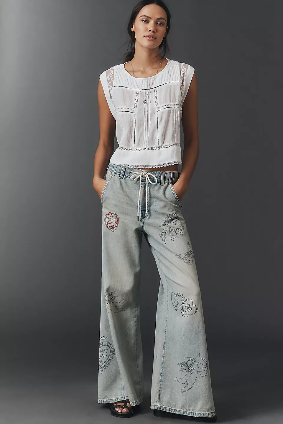The Adi Mid-Rise Flare Embellished Jeans by Pilcro - Size Small