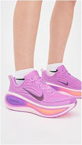 NIKE Women's Vomero Plus in Light Magenta/Pink Foam/Bright Violet/Black - 9R