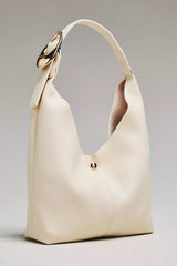 The Love Knot Slouchy Bag: Mini Buckle Edition by Anthropologie - Cream