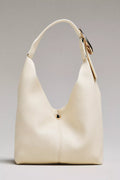 The Love Knot Slouchy Bag: Mini Buckle Edition by Anthropologie - Cream