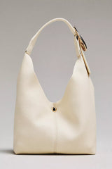 The Love Knot Slouchy Bag: Mini Buckle Edition by Anthropologie - Cream
