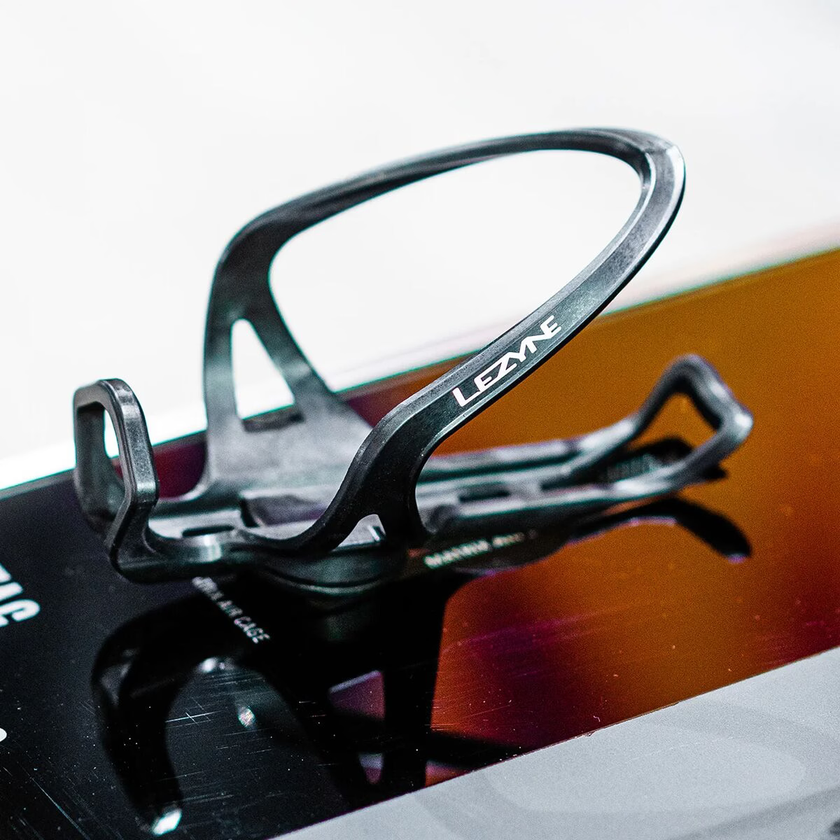 Lezyne Matrix Air Cage Bicycle Bottle Cage with Stealth Airtag Storage, Dual Side Loading, IPX7 Waterproof
