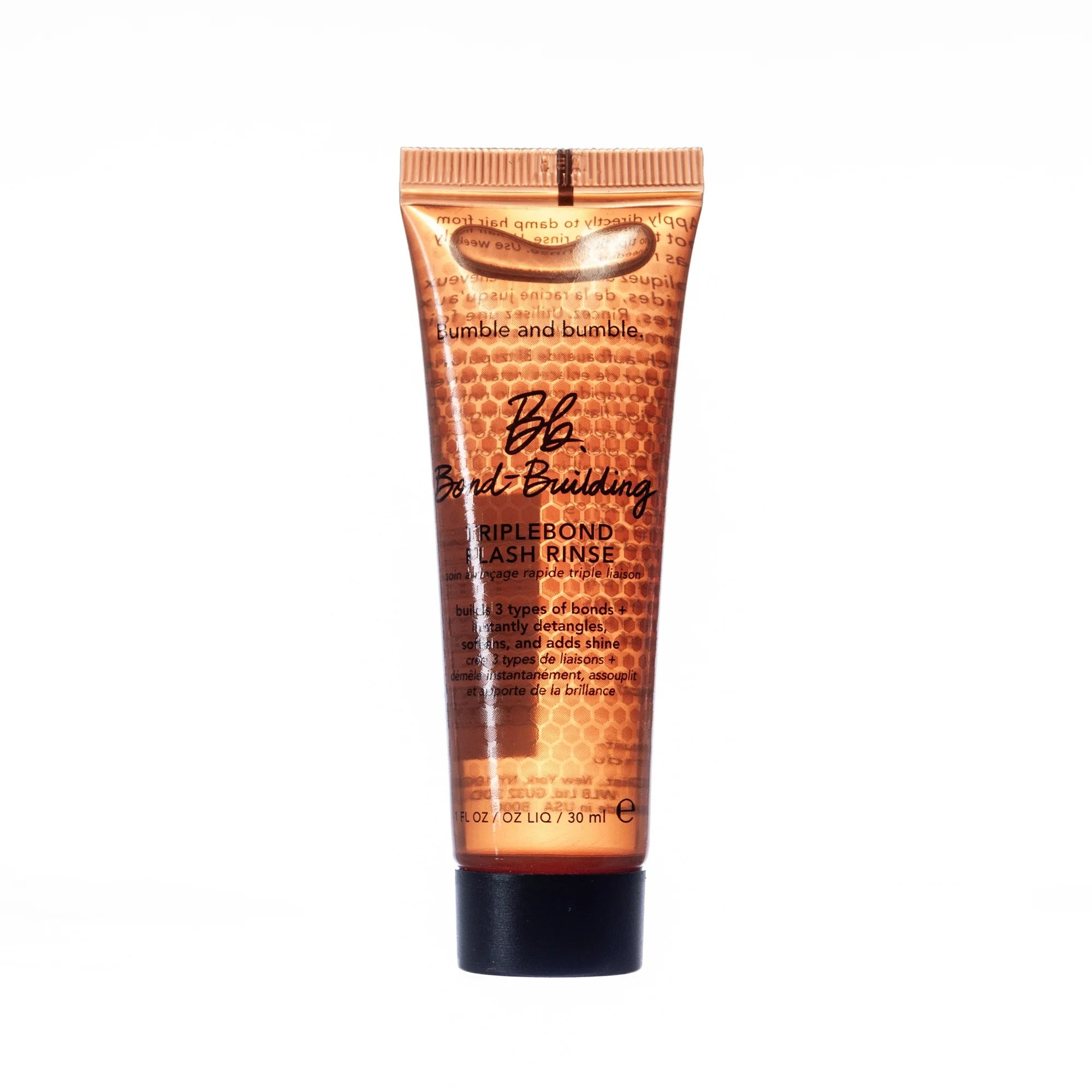 Bumble and bumble.  Bond Building Triple Bond Flash Rinse - 1oz.