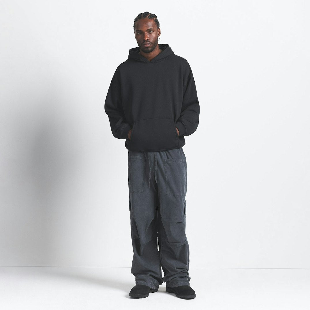 SKIMS FLEECE LOUNGE MENS RELAXED HOODIE- BLACK- MED