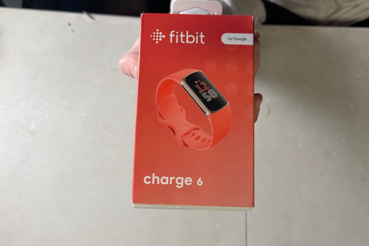 Fitbit Charge 6 Fitness Tracker with Google apps, Heart Rate on Exercise Equipment, 6-Months Premium Membership Included, GPS, Health Tools and More, Gold/Coral, One Size (S & L Bands Included)