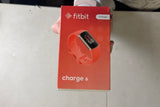 Fitbit Charge 6 Fitness Tracker with Google apps, Heart Rate on Exercise Equipment, 6-Months Premium Membership Included, GPS, Health Tools and More, Gold/Coral, One Size (S & L Bands Included)