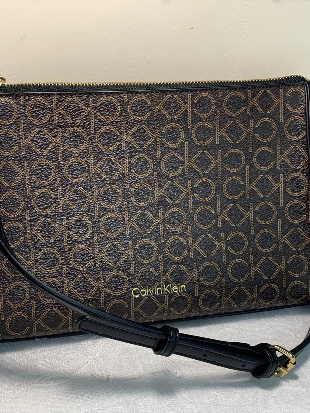 Calvin Klein Brown Monogram Cross Body Bag with Black Strap