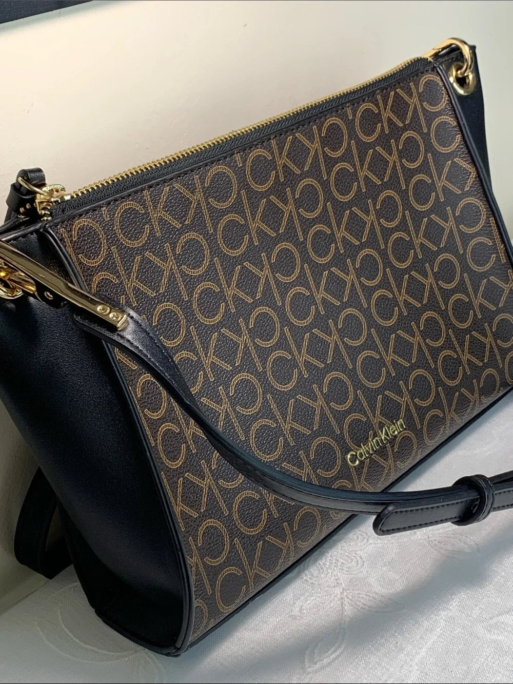 Calvin Klein Brown Monogram Cross Body Bag with Black Strap