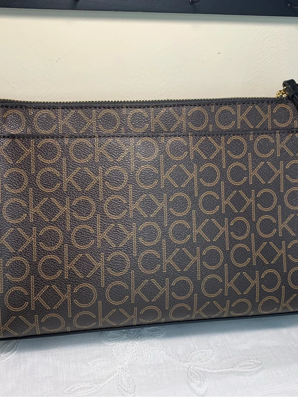 Calvin Klein Brown Monogram Cross Body Bag with Black Strap