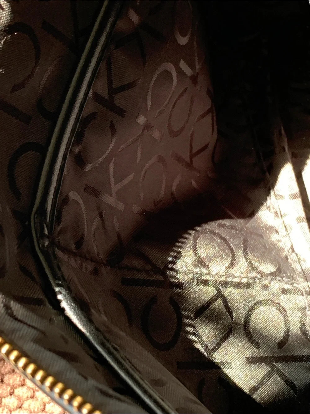 Calvin Klein Brown Monogram Cross Body Bag with Black Strap